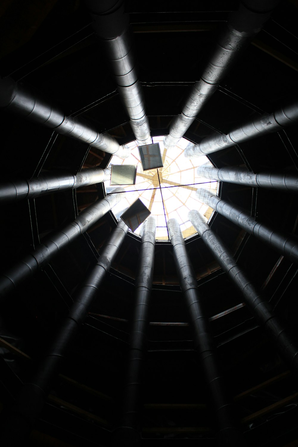 a view of the ceiling of a dark room