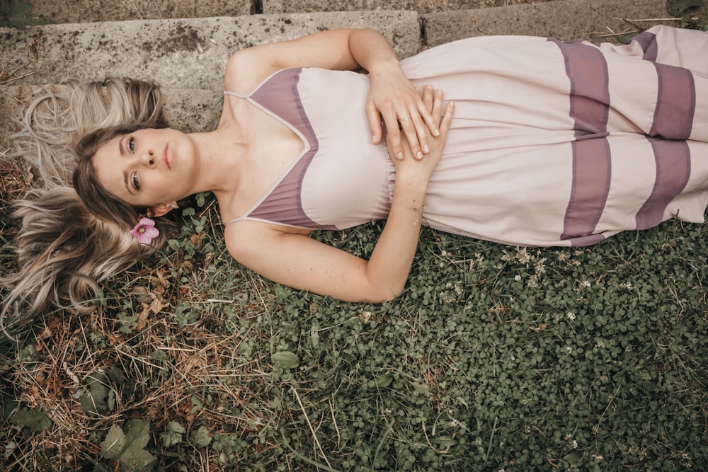 woman lying on grass