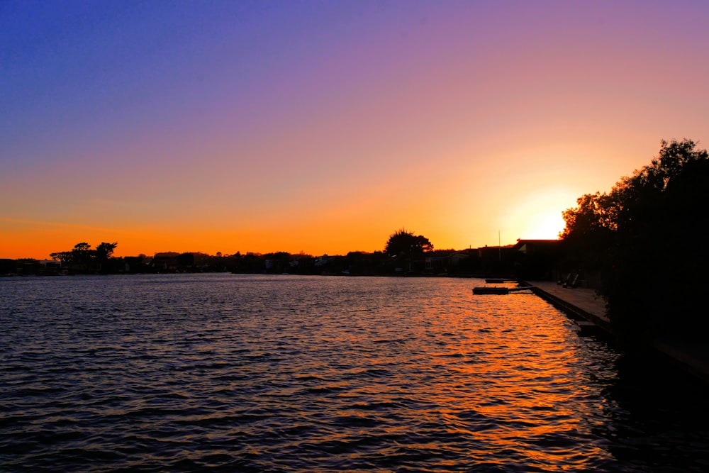 landscape photo of a sunset over a lake