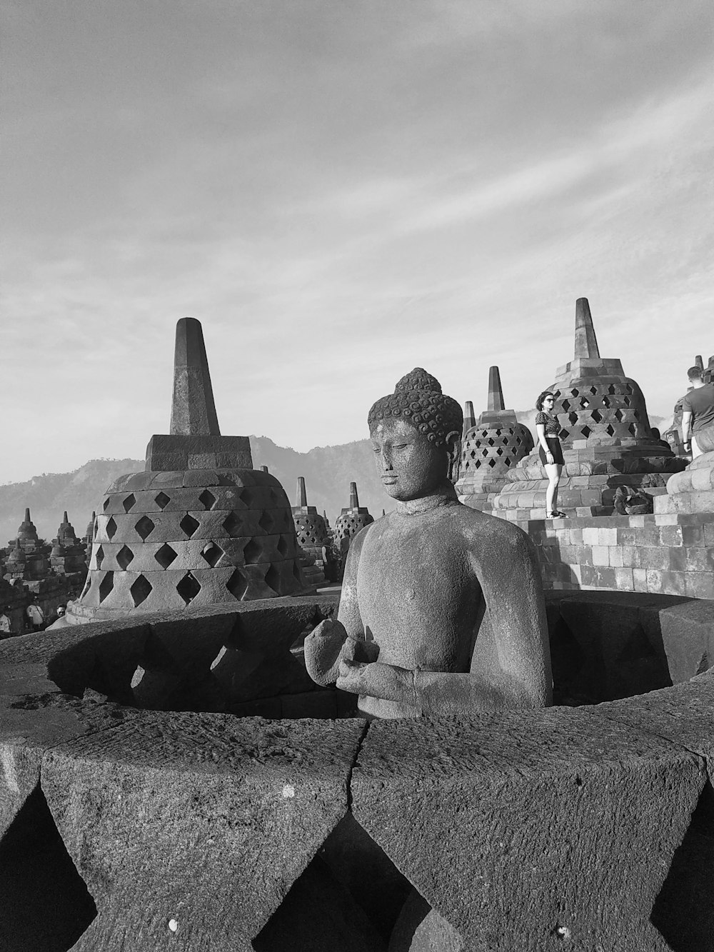 grayscale photo of Buddha statue