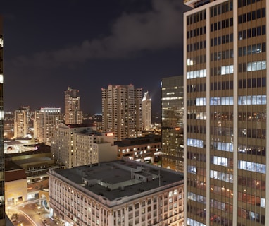 urban photo of brown buildings at night