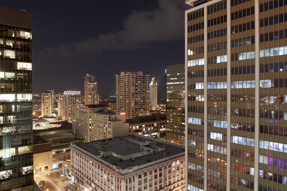 urban photo of brown buildings at night