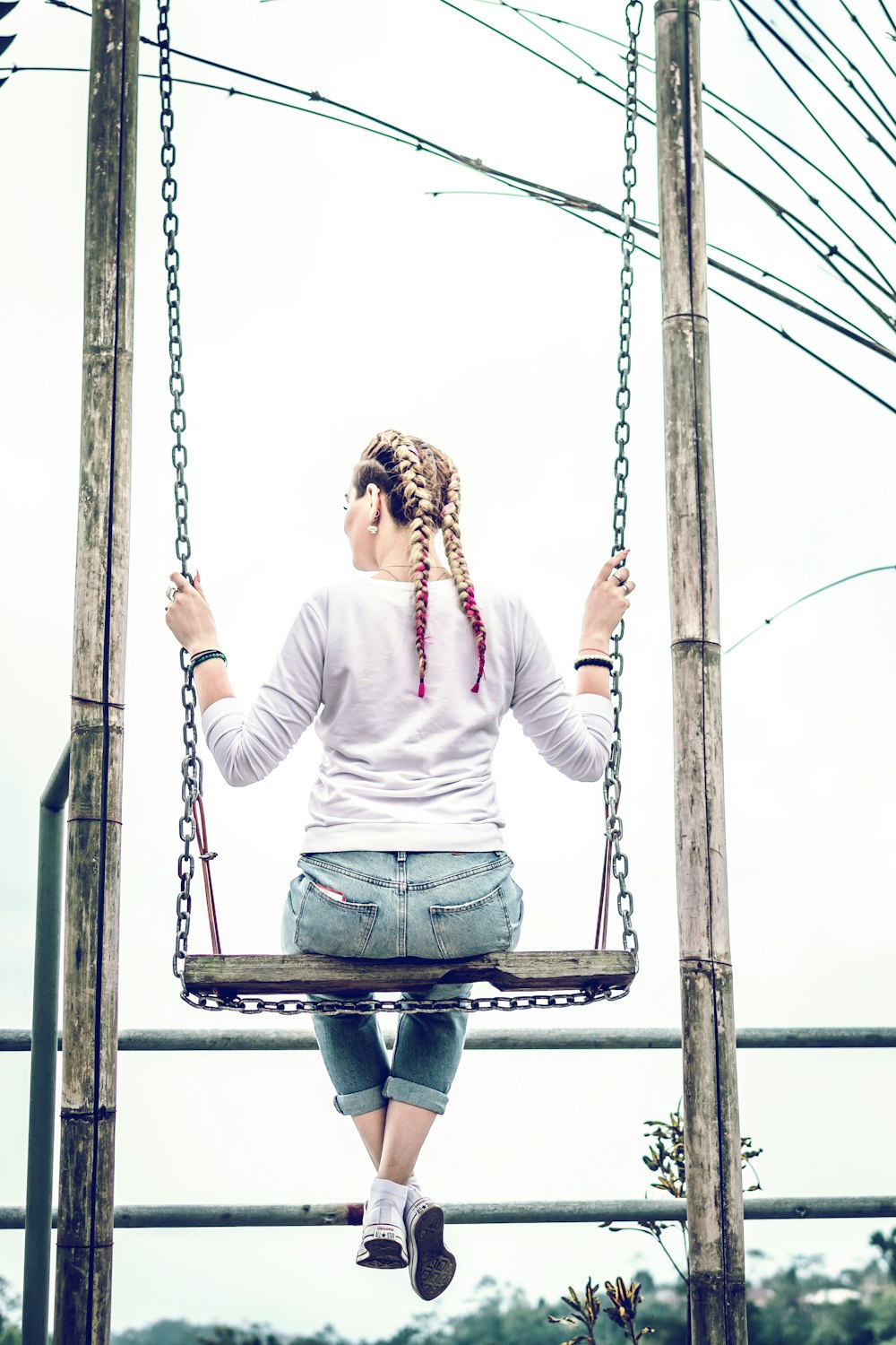 woman siting on swing