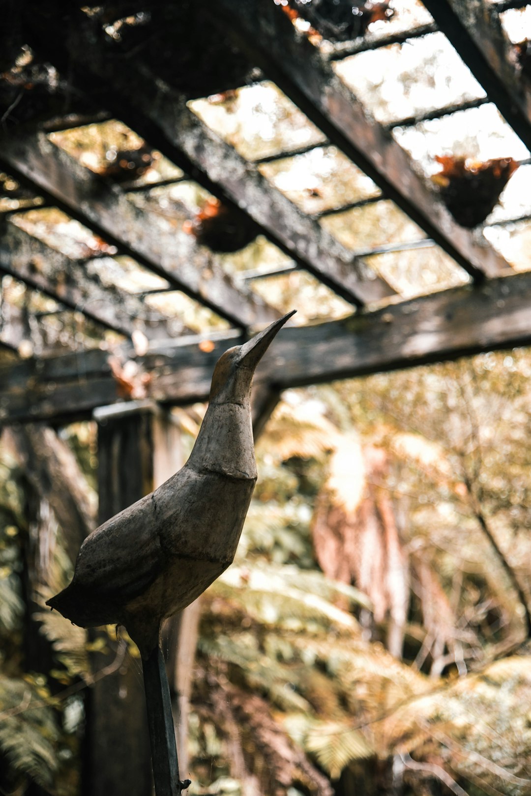 brown carving of a bird