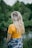 woman standing on green grass