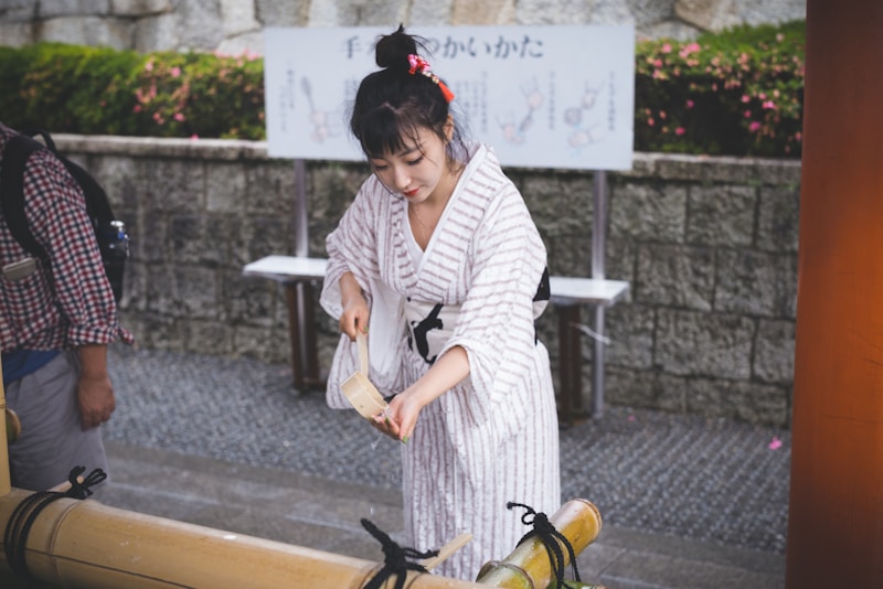 Fashionable Tokyo woman with wooden stick