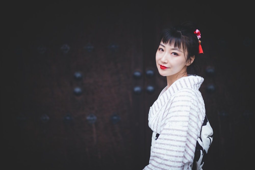 woman wearing white coat