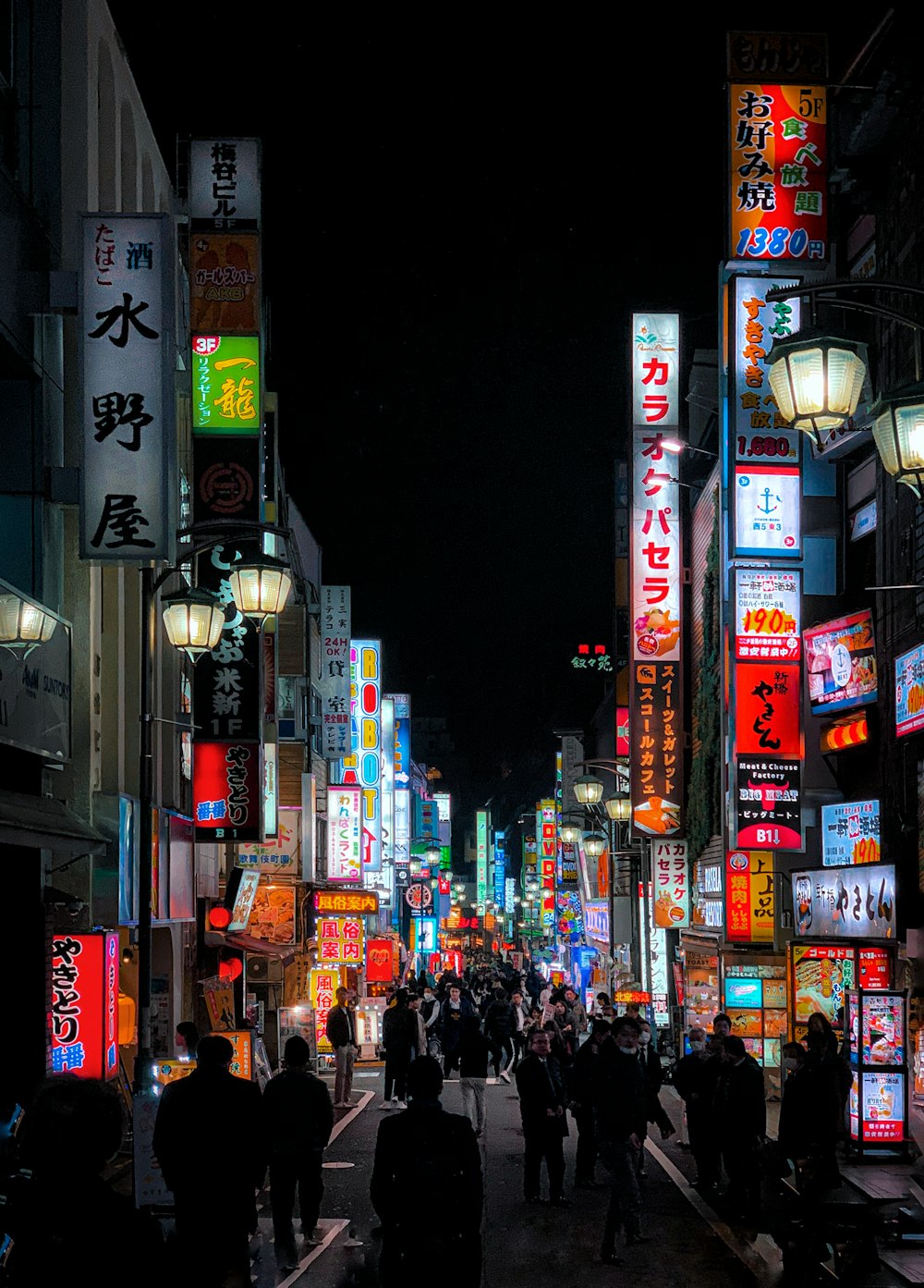 group of people walking on street