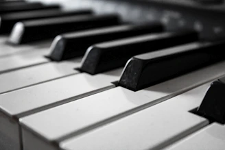grayscale photography of piano