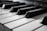 grayscale photography of piano