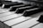 grayscale photography of piano