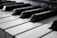 grayscale photography of piano
