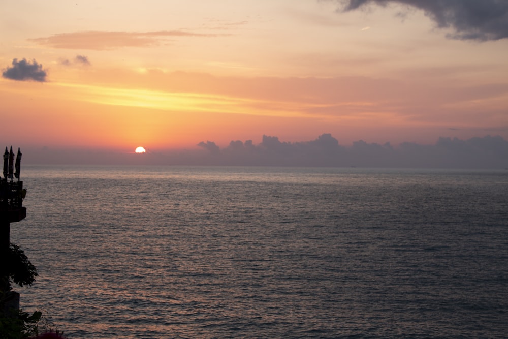 photography of body of water during golden hour