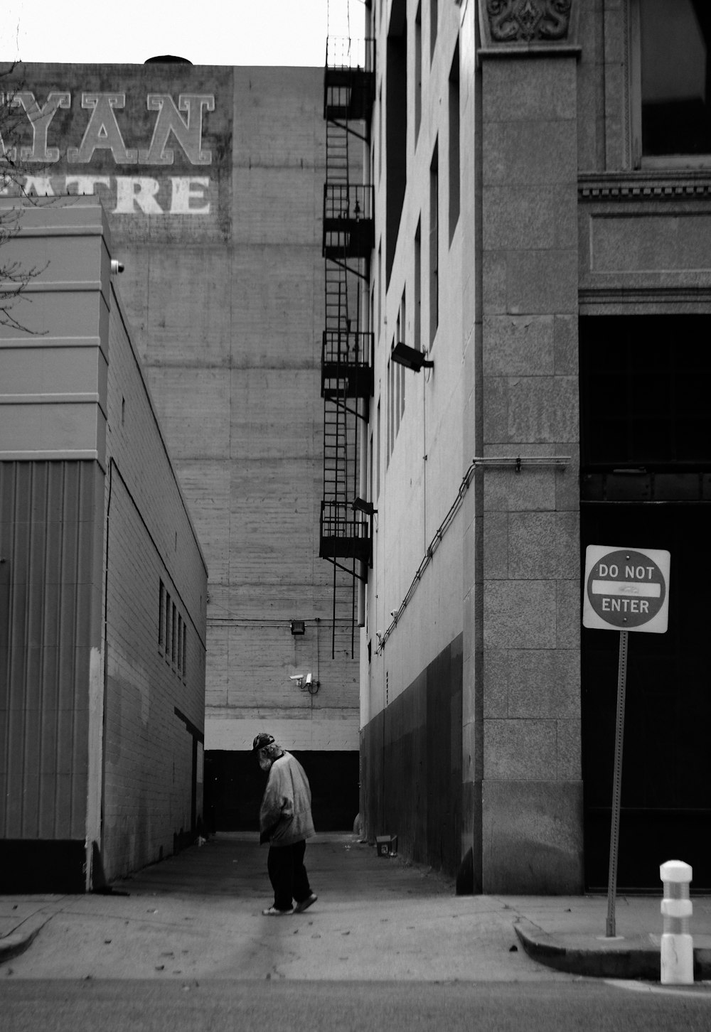 person walking on alley