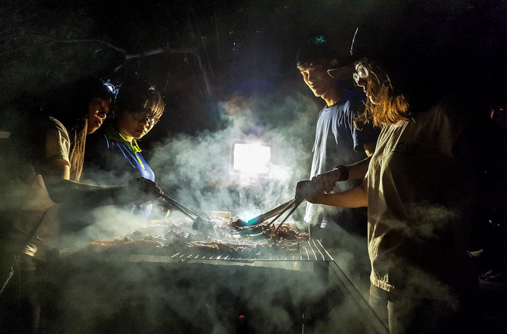 unknown person grilling outdoors