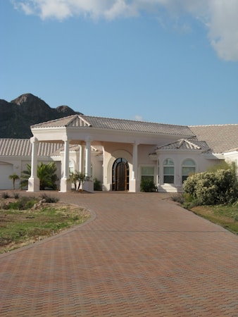 Large custom home set against desert mountains, the kind of setting found in the Summerlin foothills