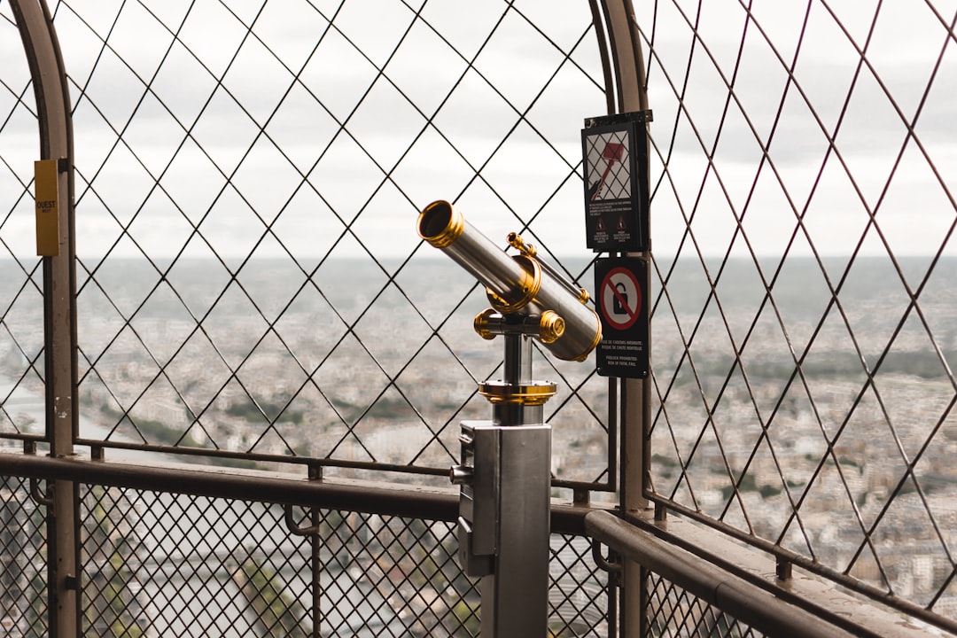 silver-colored telescope during daytime close-up photography