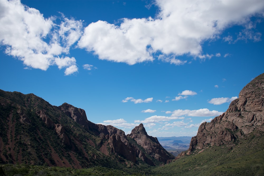 photography of brown and green mountain range during daytime