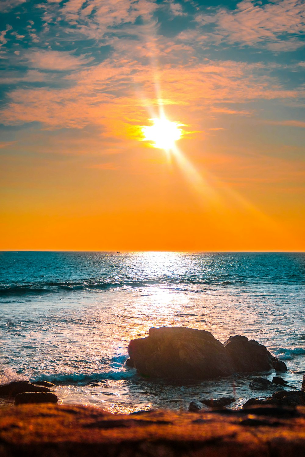 calm sea under clear blue sky