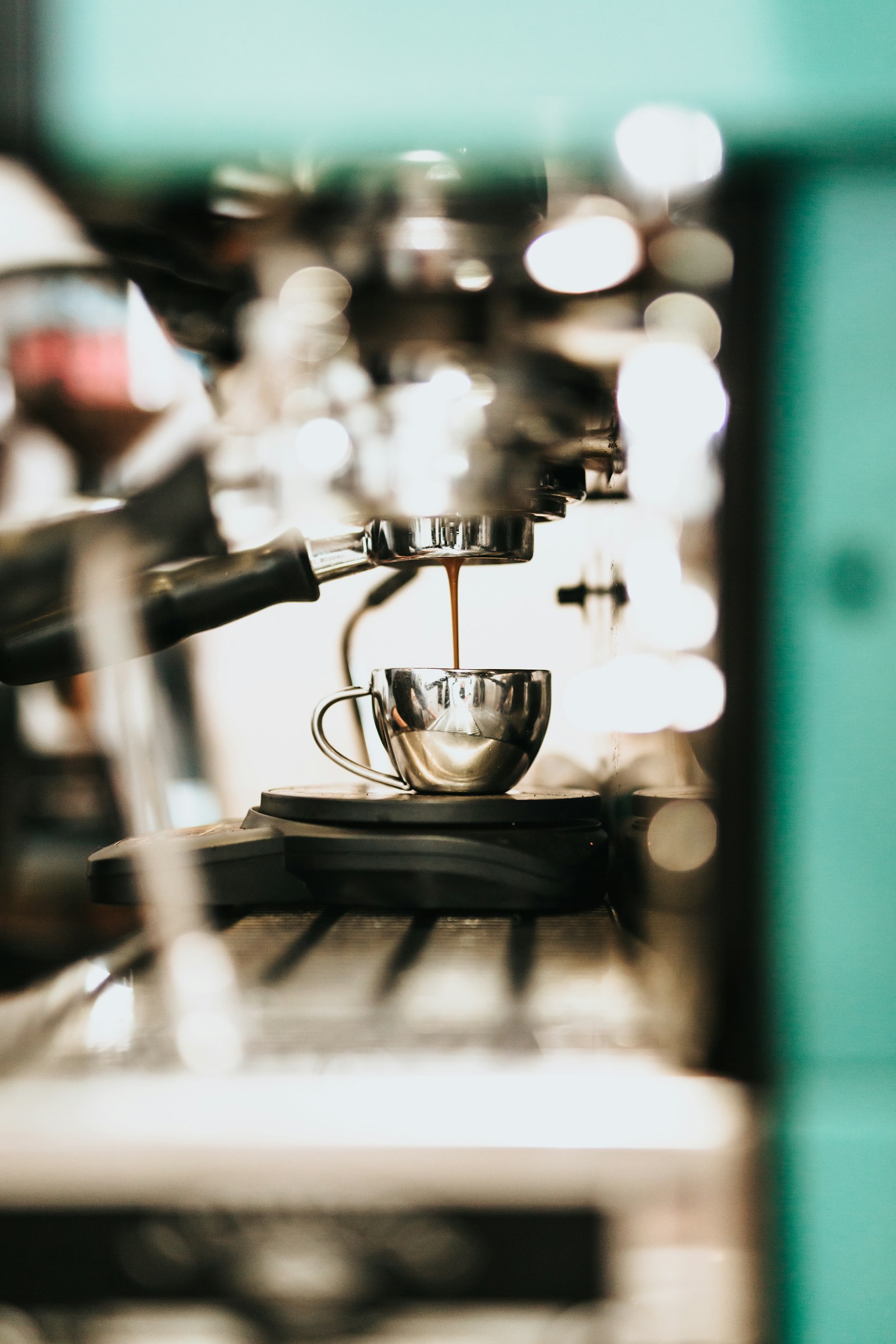 Tokina Opera 50mm F1.4 FF sample photo. Gray espresso machine photography