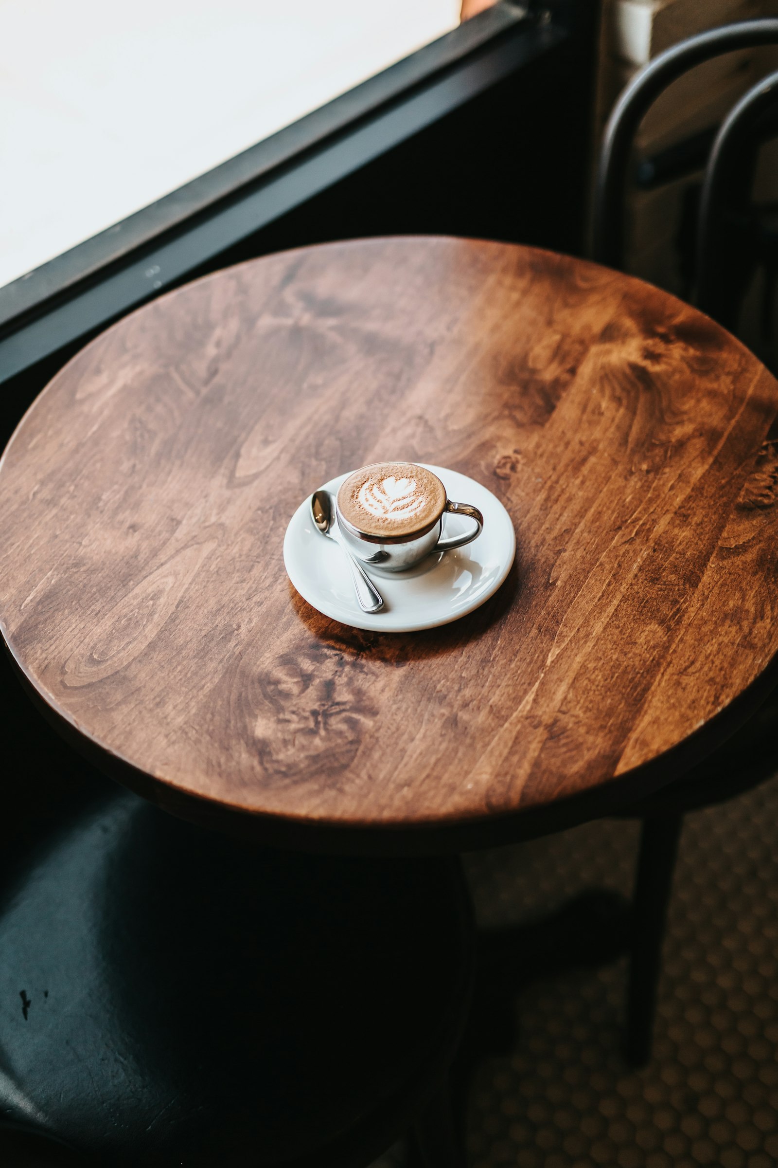 Tokina Opera 50mm F1.4 FF sample photo. Latte in cup on photography