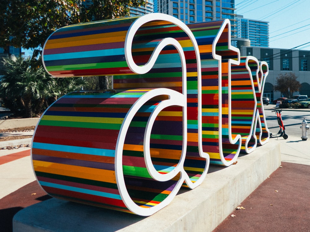 assorted-color free standing letters during daytime