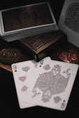 9 of hearts and Queen of clubs playing cards