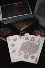 9 of hearts and Queen of clubs playing cards