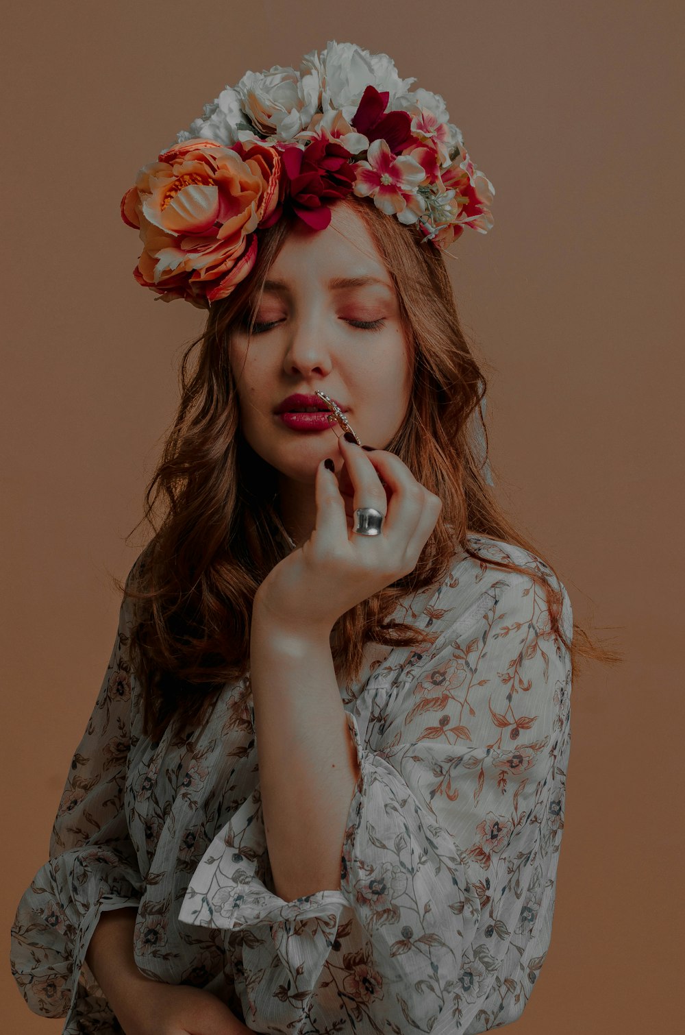 flowers on woman's head