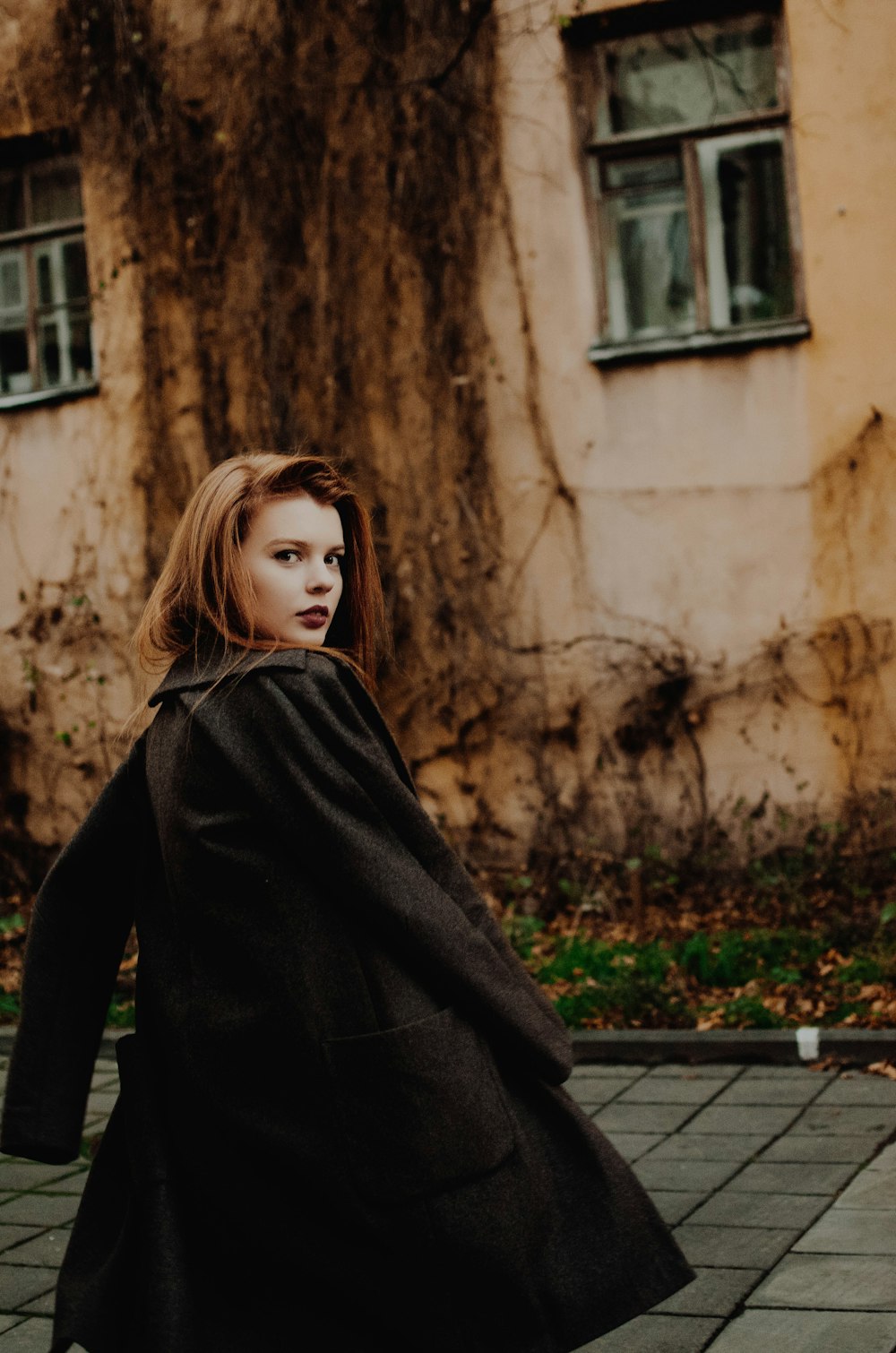 woman wearing black coat