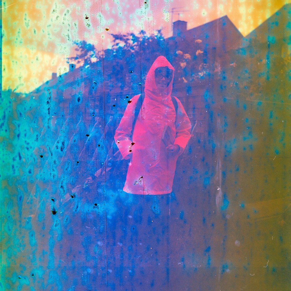 vintage photo of person wearing red raincoat