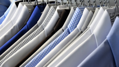 hanged assorted-color dress shirts