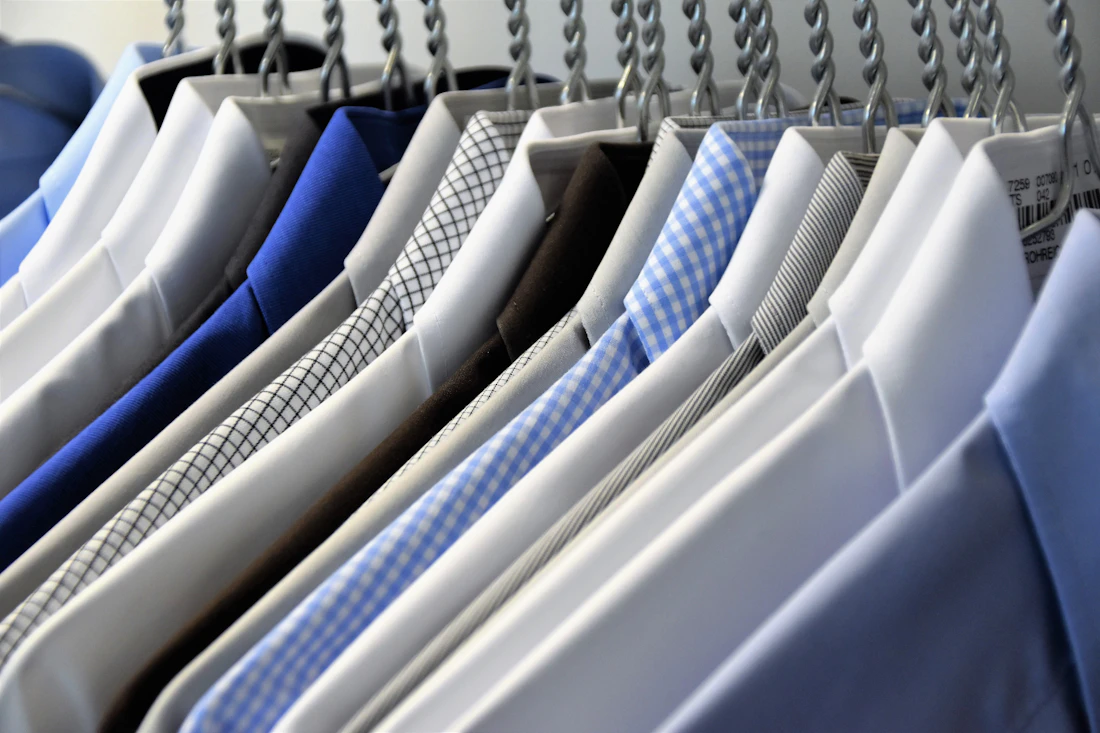 Rack of pressed shirts ready for customer pickup