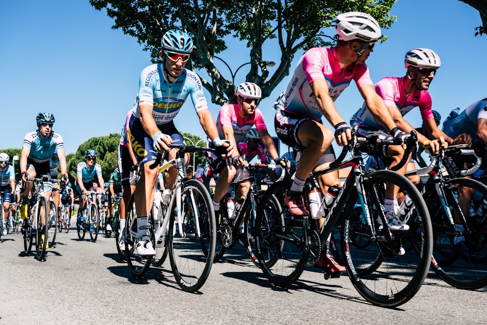 people riding on bicycle during daytime