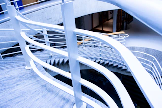 Stainless steel stair railing with clean lines and polished finish in a contemporary home.