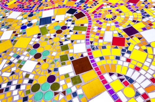 A vibrant mosaic made from various colorful geometric shapes