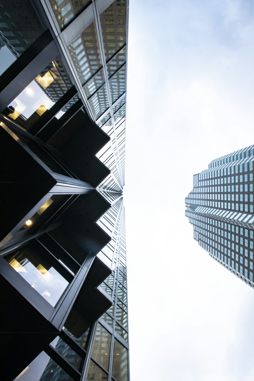 low angle photography of glass high-rise building