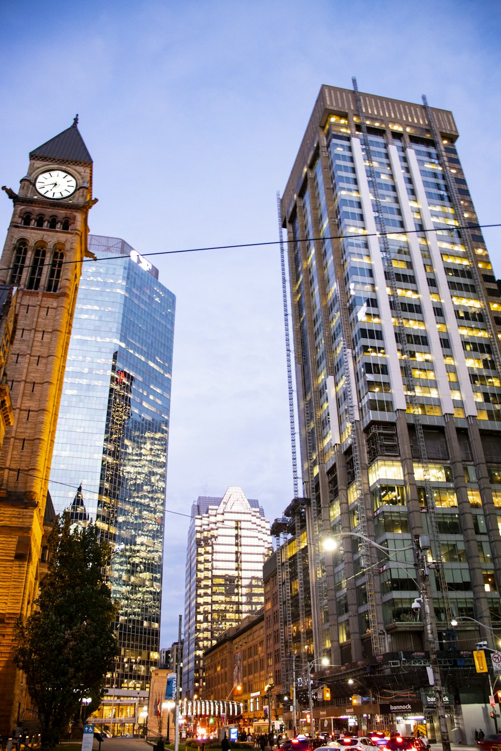 architectural photo of gray buildings and a clock tower