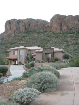 house near rock formation