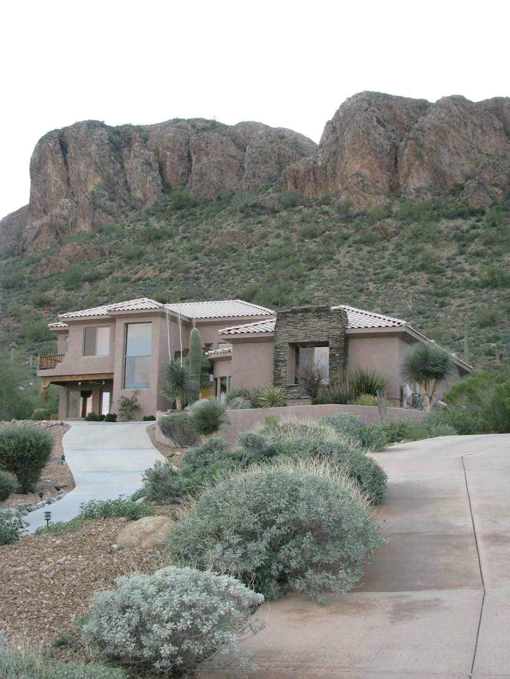 house near rock formation