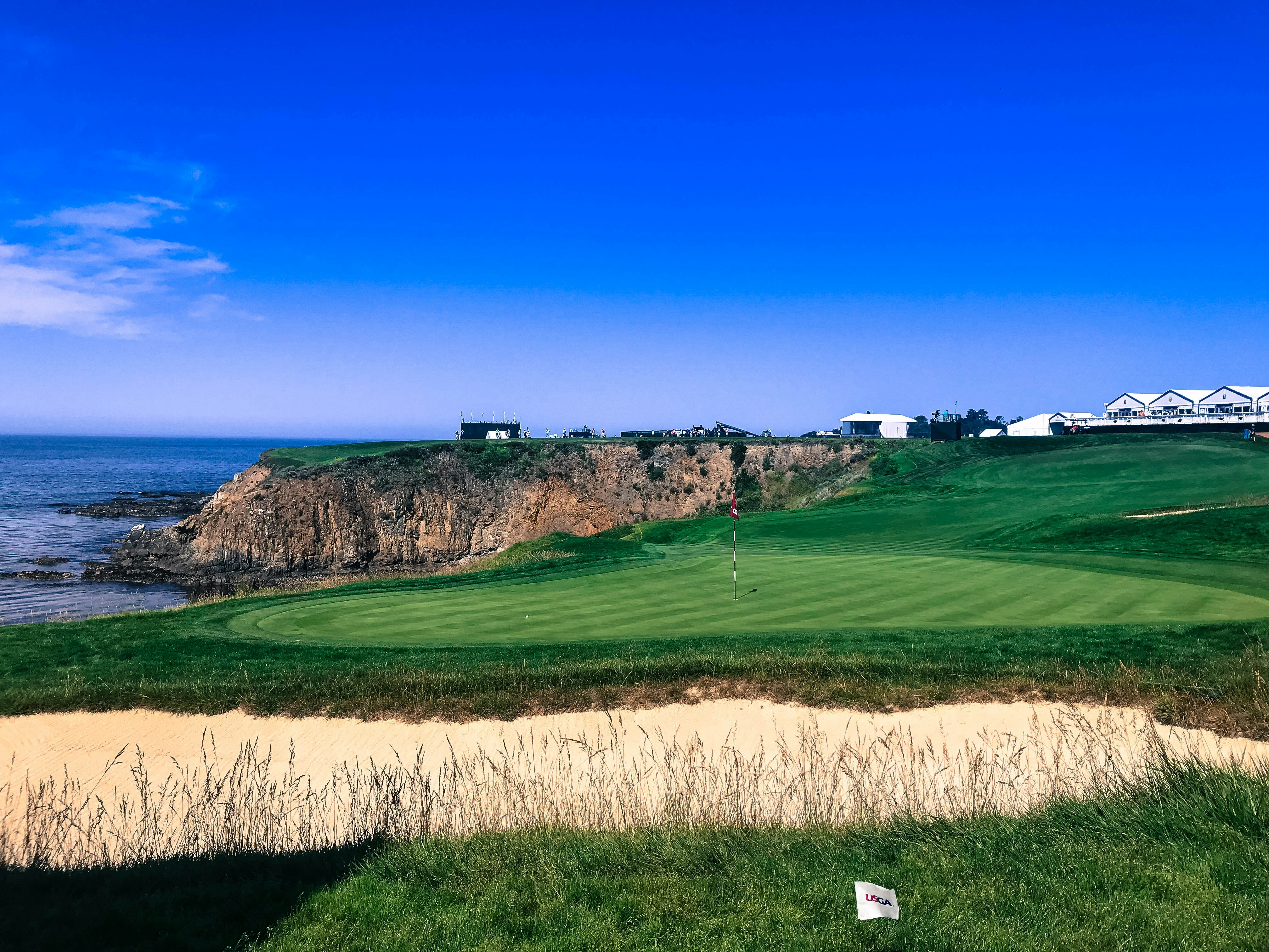 golf field near cliff overlooking ocean