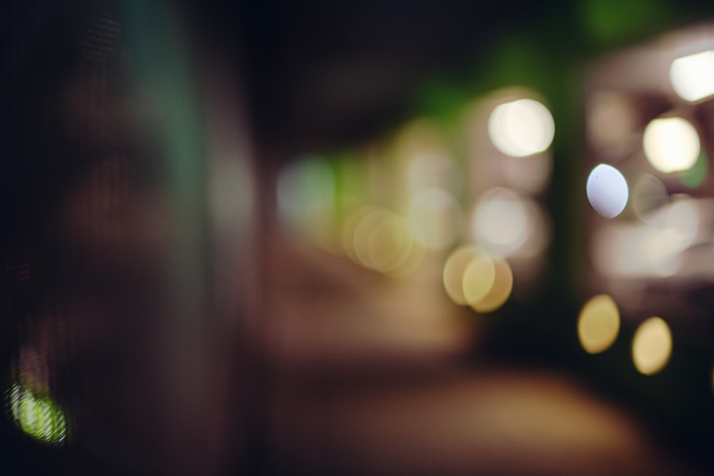 a blurry photo of a city street at night