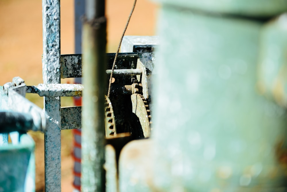 a close up of a metal object with rust