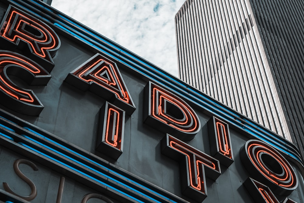 blue and red Radio City neon signage