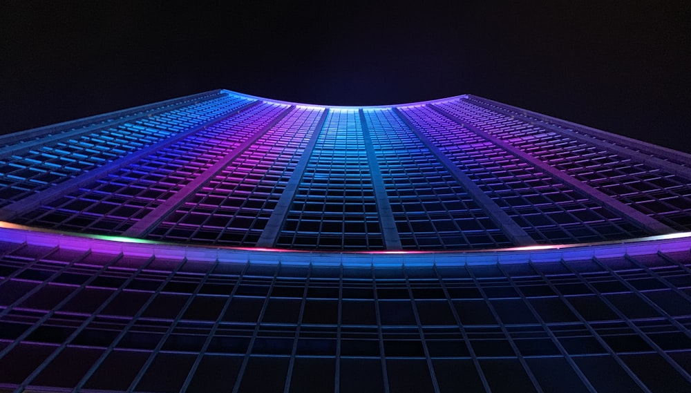 multicolored curtain wall building during nighttime
