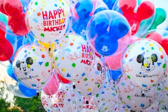 close photo of Mickey Mouse-themed balloons