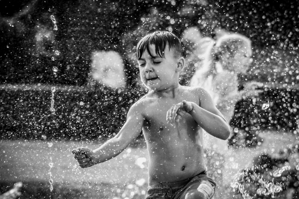 grayscale photo of boy