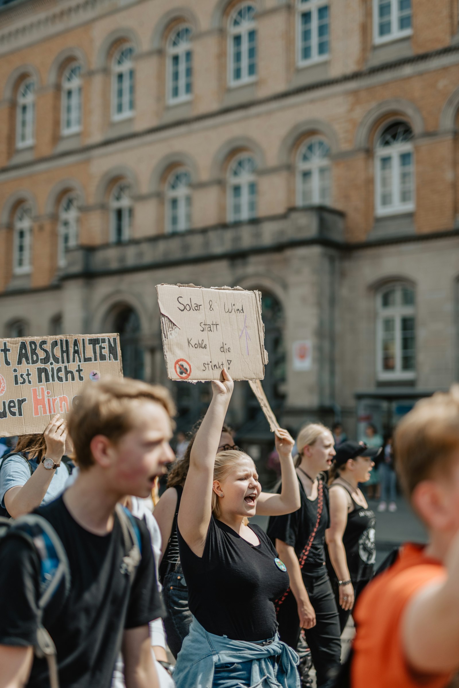 Nikon D750 + Sigma 50mm F1.4 DG HSM Art sample photo. Woman holding sign photography