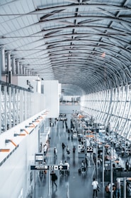 people walking inside airport station