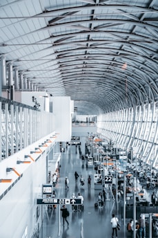 people walking inside airport station